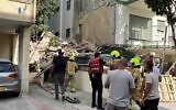 Magen David Adom paramedics arrive to the site of a scaffolding collapse in Tel Aviv which killed one construction worker on August 26, 2025. (Magen David Adom)
