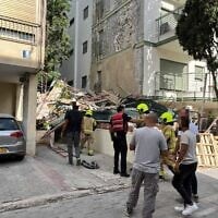 Magen David Adom paramedics arrive to the site of a scaffolding collapse in Tel Aviv which killed one construction worker on August 26, 2025. (Magen David Adom)