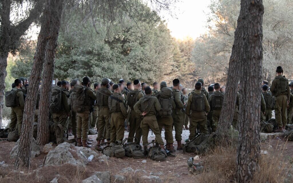 Troops of the Hasmonean Brigade are seen in a forest near Jerusalem, early August 6, 2025. (Israel Defense Forces)