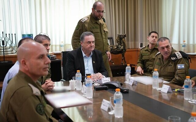 Defense Minister Israel Katz (center) and IDF chief Eyal Zamir (right) approve strikes on Yemen on August 28, 2025. (Elad Malka/Defense Ministry)