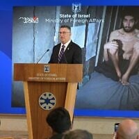 Foreign Minister Gideon Sa'ar, standing in front of an image of hostage Evyatar David, announces that he will visit New York for a UN Security Council session on the Gaza hostages, on August 4, 2025. (Shlomi Amsalem/GPO)