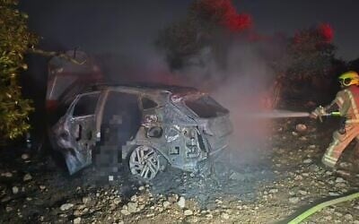 Firefighters work to extinguish burning vehicle in Horshim Forest near Kfar Qasim on August 23, 2025 (Israel Fire and Rescue Services) Firefighters work to extinguish burning vehicle in Horshim Forest near Kfar Qasim on August 23, 2025 (Israel Fire and Rescue Services)