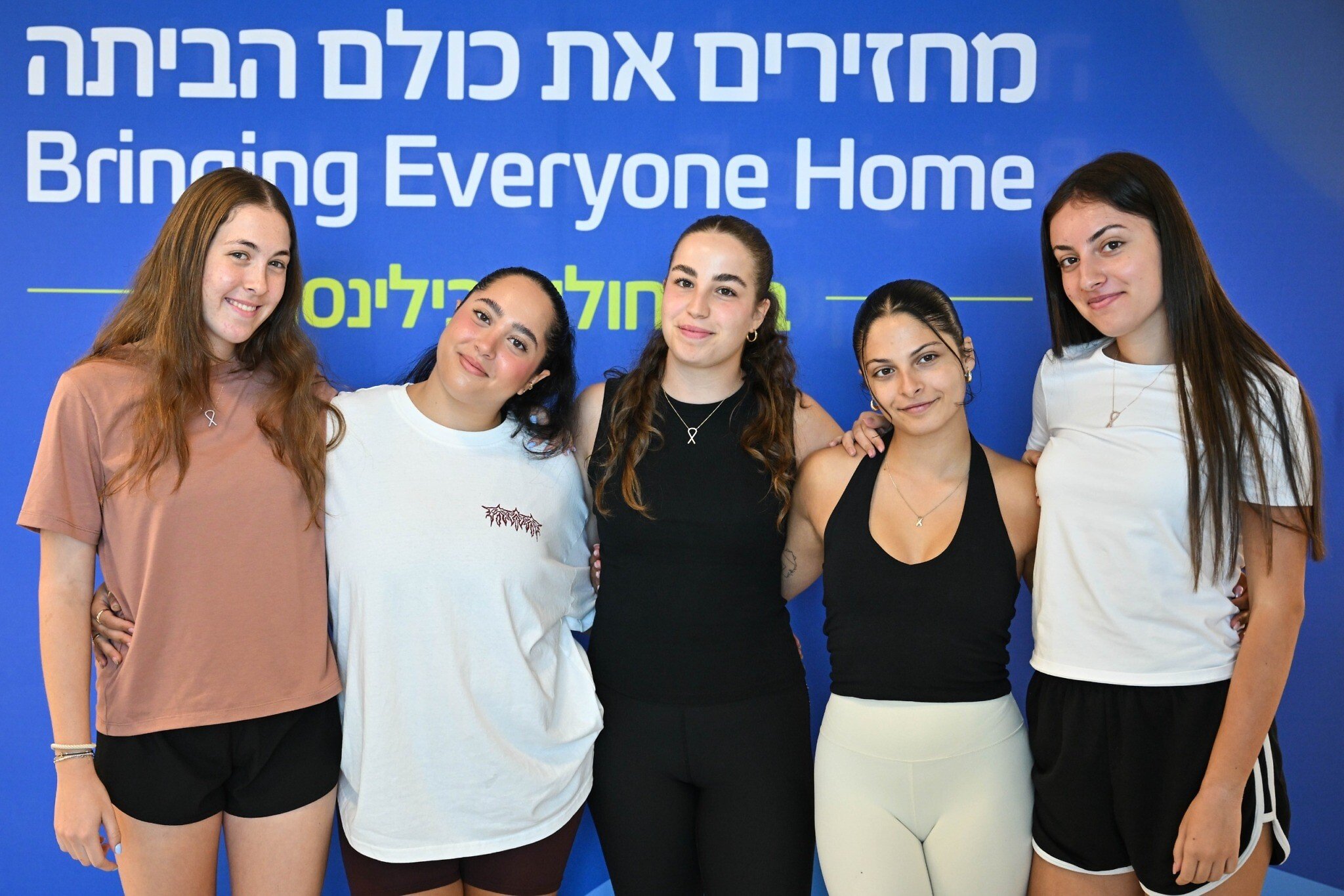 NextImg:5 ex-hostage lookout troops finish rehab, as captives’ relatives march to Gaza border
