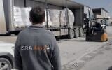 Loading of IsraAID humanitarian aid trucks on their way to Gaza, Ashdod Port, January 2025. (IsraAID)