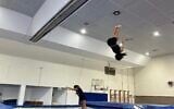 Children jump at trampoline practice in Shlomi on July 31, 2025. (Diana Bletter/Times of Israel)