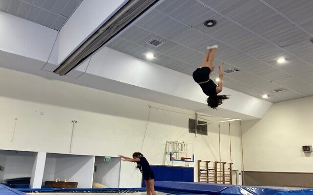 Children jump at trampoline practice in Shlomi on July 31, 2025. (Diana Bletter/Times of Israel)