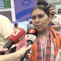 Padma Joshi, whose son Bipin Joshi is held hostage in the Gaza Strip, speaks to reporters after arriving at Ben Gurion Airport near Tel Aviv, on August 11, 2025. (Screen capture via Ynet)