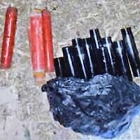 Explosives seized during a raid on an apartment that police say was used by a Palestinian father and son to plan terror attacks, photo published August 10, 2025. (Israel Police)