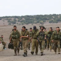 Israeli reserve soldiers seen during military training in the Golan Heights, northern Israel, October 30, 2023. (David Cohen/ Flash90)