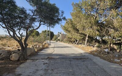 The main road in the village of Nu’man, East Jerusalem, August 19, 2025. (Nurit Yohanan, The Times of Israel).