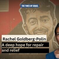 People walk next to a mural of hostage Hersh Goldberg-Polin in central Jerusalem, August 18, 2025. (Photo by Chaim Goldberg/Flash90)