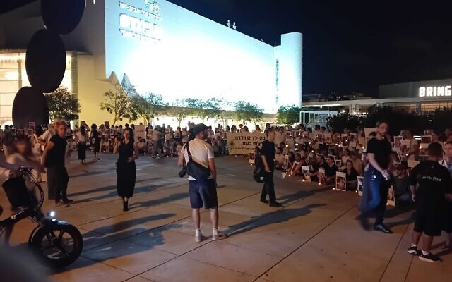 Left-wing activists hold vigil for Gaza children killed by Israel since the Hamas onslaught of October 7, 2023, at Tel Aviv's Habima Square, September 30, 2025. (Noam Lehmann/The Times of Israel)