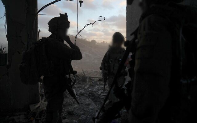 IDF troops seen operating in the Gaza Strip in this handout photo cleared for publication on September 15, 2025. (IDF)