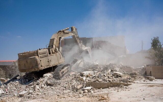 IDF troops demolish the home of a Palestinian gunman who carried out a deadly shooting attack, in the West Bank village of Aqabah, September 9, 2025. (Israel Defense Forces)