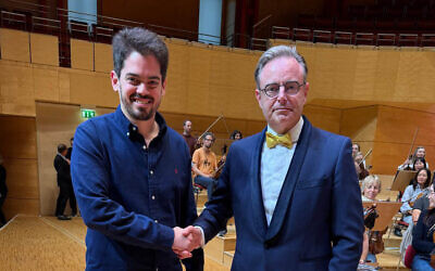 Belgium’s Prime Minister Bart De Wever (R) poses with Israeli conductor Lahav Shani (L) following his performance with a philharmonic orchestra in Essen, Germany, September 13, 2025. (Bart De Wever via X)