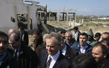 Former British Prime Minister and Middle East envoy Tony Blair (center) visits Beit Hanun in the northern Gaza Strip, in his first visit to the Hamas-run enclave since being appointed, March 1, 2009. (Mahmud Hams/AFP)