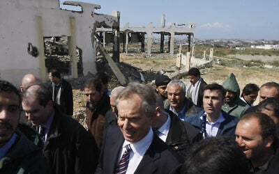 Former British Prime Minister and Middle East envoy Tony Blair (center) visits Beit Hanun in the northern Gaza Strip, in his first visit to the Hamas-run enclave since being appointed, March 1, 2009. (Mahmud Hams/AFP)