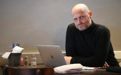 Screenwriter Hagai Levi poses for a picture during an interview with AFP on January 7, 2020 in Tel Aviv. (JACK GUEZ / AFP)
