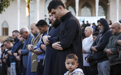 Muslim worshippers participate in Eid al-Fitr prayers, marking the end of the holy month of Ramadan, outside the Lakemba Mosque in Sydney, Australia on April 10, 2024. (DAVID GRAY / AFP)