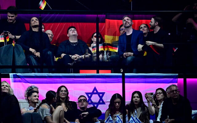 German singer ISAAK (Isaak Guderian) representing Germany with the song "Always on the Run" (top) and Israeli singer Eden Golan representing Israel with the song "Hurricane" (bottom) react during vote count during the final of the 68th Eurovision Song Contest (ESC) 2024 on May 11, 2024 at the Malmo Arena in Malmo, Sweden. (Photo by Tobias SCHWARZ / AFP) German singer ISAAK (Isaak Guderian) representing Germany with the song "Always on the Run" (top) and Israeli singer Eden Golan representing Israel with the song "Hurricane" (bottom) react during vote count during the final of the 68th Eurovision Song Contest (ESC) 2024 on May 11, 2024 at the Malmo Arena in Malmo, Sweden. (Photo by Tobias SCHWARZ / AFP)