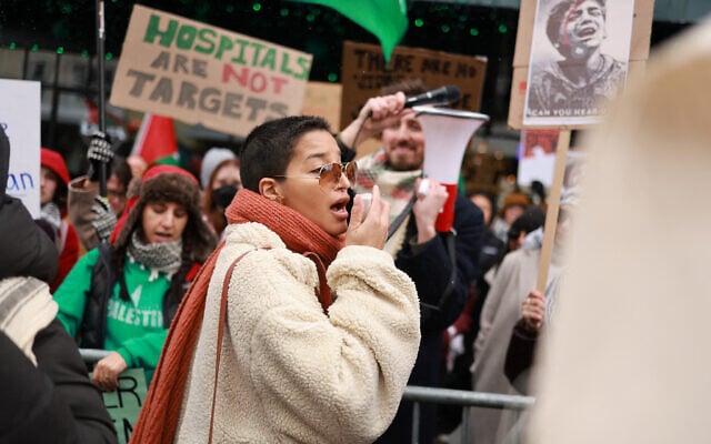 Pro-Palestinian, anti-Israel protesters hoist flags and signs as they are addressed by Indya Moore during a Let Gaza Live march in Park City, Utah, January 21, 2025. (Matt Winkelmeyer/Getty Images/AFP) Pro-Palestinian, anti-Israel protesters hoist flags and signs as they are addressed by Indya Moore during a Let Gaza Live march in Park City, Utah, January 21, 2025. (Matt Winkelmeyer/Getty Images/AFP)