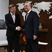 German Foreign Minister Johann Wadephul (L) poses for a picture with Palestinian Authority Prime Minister Mohammad Mustafa in Ramallah in the West Bank on May 11, 2025. (Zain Jaafar/AFP)