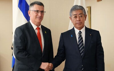 Foreign Minister Gideon Sa'ar (L) shakes hands with his Japanese counterpart Takeshi Iwaya at the Foreign Ministry in Tokyo on May 13, 2025. (Photo by Kazuhiro NOGI / AFP) Foreign Minister Gideon Sa'ar (L) shakes hands with his Japanese counterpart Takeshi Iwaya at the Foreign Ministry in Tokyo on May 13, 2025. (Photo by Kazuhiro NOGI / AFP)