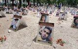 Portraits of slain Iranians are displayed in an area of Esplanades des Invalides in Paris on July 8, 2025, as part of a campaign by French human rights activists to stop executions in the Islamic Republic. (Delphine TOUITOU / AFP)
