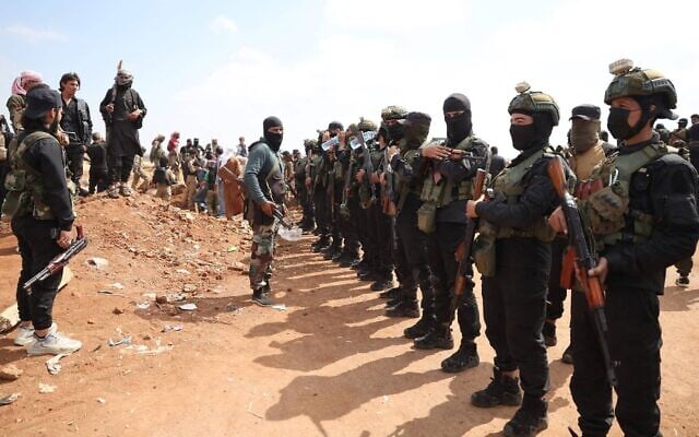 Syrian government security forces set up a checkpoint in the town of Busra al-Hariri, east of the city of Sweida, on July 20, 2025, to prevent armed tribal fighters from advancing towards the city. (Omar Haj Kadour / AFP) Syrian government security forces set up a checkpoint in the town of Busra al-Hariri, east of the city of Sweida, on July 20, 2025, to prevent armed tribal fighters from advancing towards the city. (Omar Haj Kadour / AFP)