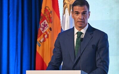 Spanish Prime Minister Pedro Sanchez speaks during a meeting with Spanish businessmen in Montevideo on July 22, 2025. (Santiago Mazzarovich / AFP)