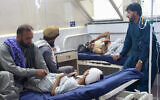 Injured Afghan people receive treatment at a hospital after an earthquake in Afghanistan's Jalalabad on September 1, 2025. (Aimal ZAHIR / AFP)