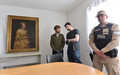 A painting identified by Dutch newspaper AD as believed to be "Portrait of a Lady" by Italian baroque portraitist Giuseppe Ghislandi (16551743), stolen by the Nazis from a Dutch Jewish art collector, is displayed at the Public Prosecutor's Office in Mar del Plata, Argentina, on September 3, 2025. (AFP)