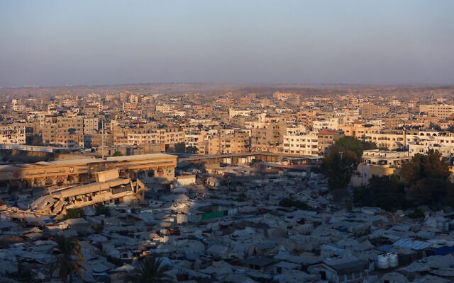 A picture shows a view of a makeshift displacement camp at the Yarmuk Sports Stadium, once a soccer arena, with a view of Gaza City on September 4, 2025 (Omar Al-Qattaa / AFP) A picture shows a view of a makeshift displacement camp at the Yarmuk Sports Stadium, once a soccer arena, with a view of Gaza City on September 4, 2025 (Omar Al-Qattaa / AFP)