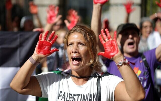 A protestor shows her red-tainted hands during a pro-Palestinian, anti-Israel demonstration in front of the Israeli Embassy in Madrid, on September 6, 2025. (Thomas COEX / AFP) A protestor shows her red-tainted hands during a pro-Palestinian, anti-Israel demonstration in front of the Israeli Embassy in Madrid, on September 6, 2025. (Thomas COEX / AFP)