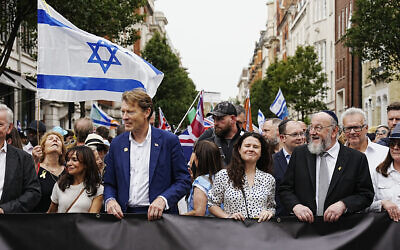 Reform UK Deputy Leader Richard Tice (centre left) and Chief Rabbi Ephraim Mirvis (3R) lead a 'march against antisemitism' demonstration in central London, on September 7, 2025, (Photo by CARLOS JASSO / AFP)