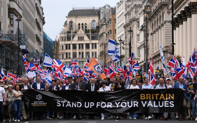 Former Conservative cabinet minister Michael Gove, Reform UK Deputy Leader Richard Tice and Chief Rabbi Ephraim Mirvis lead a 'march against antisemitism' demonstration in central London, on September 7, 2025, (Photo by CARLOS JASSO / AFP) Former Conservative cabinet minister Michael Gove, Reform UK Deputy Leader Richard Tice and Chief Rabbi Ephraim Mirvis lead a 'march against antisemitism' demonstration in central London, on September 7, 2025, (Photo by CARLOS JASSO / AFP)