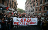 Demonstrators gather to march to express their support for the Global Sumud Flotilla that was sailing toward Gaza, in Rome on September 7, 2025 (Filippo Monteforte / AFP)