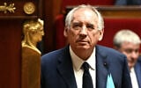 French Prime Minister Francois Bayrou arrives to deliver his general policy statement during the parliamentary extraordinary session prior to a confidence vote over the government's austerity budget, at the National Assembly in Paris, France, September 8, 2025. (Bertrand GUAY / AFP)