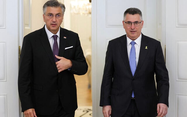 Croatia's Prime Minister Andrej Plenkovic, left, welcomes Foreign Minister Gideon Sa'ar following a meeting at the government building in Zagreb, on September 9, 2025. (DAMIR SENCAR / AFP) Croatia's Prime Minister Andrej Plenkovic, left, welcomes Foreign Minister Gideon Sa'ar following a meeting at the government building in Zagreb, on September 9, 2025. (DAMIR SENCAR / AFP)