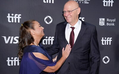 Noam Tibon (right) and his wife Gali Mir-Tibon attend the premiere of 'The Road Between Us: The Ultimate Rescue,' at the 2025 Toronto International Film Festival, at Roy Thomson Hall on September 10, 2025, in Toronto, Ontario. (Shawn Goldberg / Getty Images via AFP)