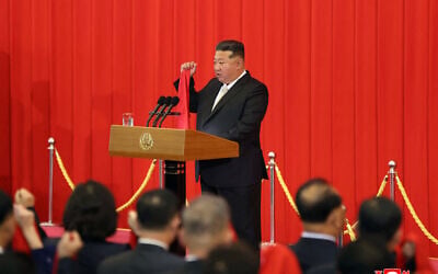 North Korean leader Kim Jong Un attends the flag-raising ceremony and central oath-taking rally to commemorate the 77th anniversary of the founding of the Democratic People's Republic of Korea at Mansudae Assembly Hall in Pyongyang, in a picture taken on September 9, 2025. (KCNA VIA KNS / AFP) /