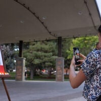 People attend a vigil for conservative activist Charlie Kirk, who was shot at a public event at Utah Valley University in Orem, Utah, on September 10, 2025. (Melissa MAJCHRZAK / AFP)