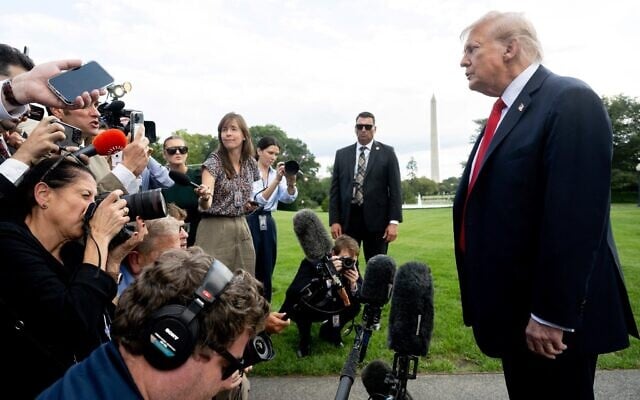 US President Donald Trump speaks to the press before boarding Marine One prior to departing the White House in Washington, September 11, 2025. (Saul Loeb/AFP)