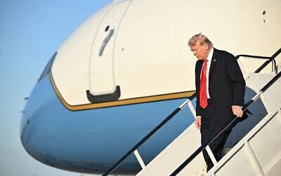 US President Donald Trump steps off Air Force One upon arrival at LaGuardia Airport in New York on September 11, 2025. (Mandel NGAN / AFP)