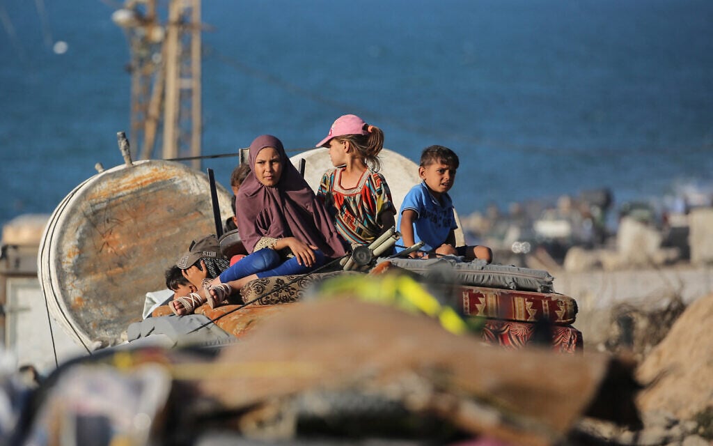 Children sit atop piled up mattresses as Palestinians flee south from Gaza City with their belongings, via on the coastal road near the Nuseirat refugee camp in the central Gaza Strip, on September 12, 2025. (Eyad BABA / AFP) Children sit atop piled up mattresses as Palestinians flee south from Gaza City with their belongings, via on the coastal road near the Nuseirat refugee camp in the central Gaza Strip, on September 12, 2025. (Eyad BABA / AFP)