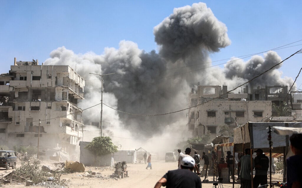 The Mhanna tower collapses amid heavy smoke, after an Israeli strike following an evacuation order in the Tal el-Hawa neighborhood of Gaza City on September 14, 2025 (Omar AL-QATTAA / AFP) The Mhanna tower collapses amid heavy smoke, after an Israeli strike following an evacuation order in the Tal el-Hawa neighborhood of Gaza City on September 14, 2025 (Omar AL-QATTAA / AFP)