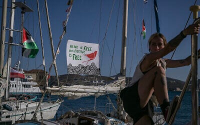 A banner in support of Palestinians is seen tied to a vessel at the port of Syros in Greece, before the departure of two vessels to join the Global Sumud Flotilla, an international mission aiming to break the Israeli blockade of Gaza, on September 14, 2025. (Aris MESSINIS / AFP) A banner in support of Palestinians is seen tied to a vessel at the port of Syros in Greece, before the departure of two vessels to join the Global Sumud Flotilla, an international mission aiming to break the Israeli blockade of Gaza, on September 14, 2025. (Aris MESSINIS / AFP)