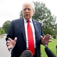 US President Donald Trump speaks to the press prior to boarding Marine One as he departs from the South Lawn of the White House in Washington, DC, on September 16, 2025. Trump is heading to the UK for a State Visit. (SAUL LOEB / AFP)