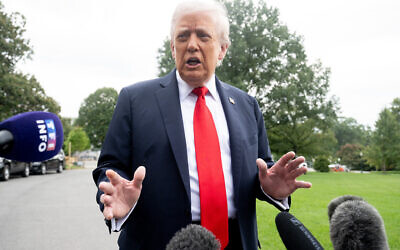 US President Donald Trump speaks to the press prior to boarding Marine One as he departs from the South Lawn of the White House in Washington, DC, on September 16, 2025. Trump is heading to the UK for a State Visit. (SAUL LOEB / AFP)