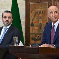Syrian Foreign Minister Asaad al-Shaibani (L) watches as US special envoy for Syria Tom Barrack speaks during a press conference in Damascus on September 16, 2025. (Louai Beshara/AFP)